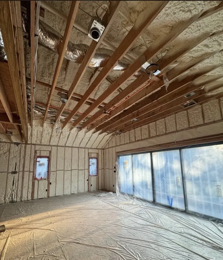 Interior walls and ceiling insulated with spray foam during new construction in Dumas